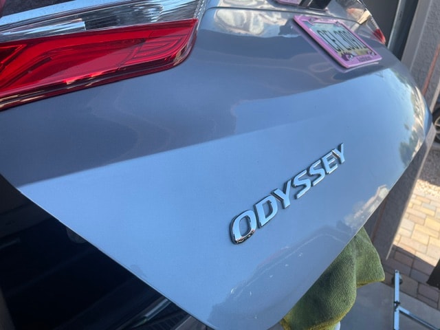 Honda Odyssey rear panel smooth and restored after paintless dent repair